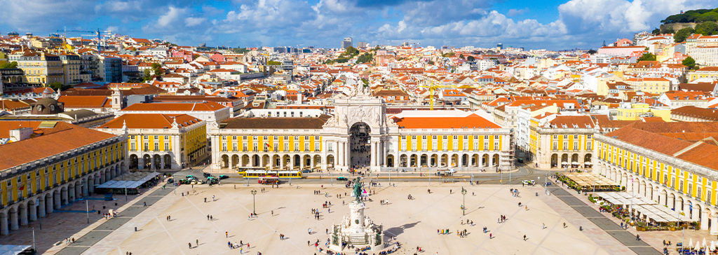 Image of Praça do Comércio Lisbon from high ground with people strolling along